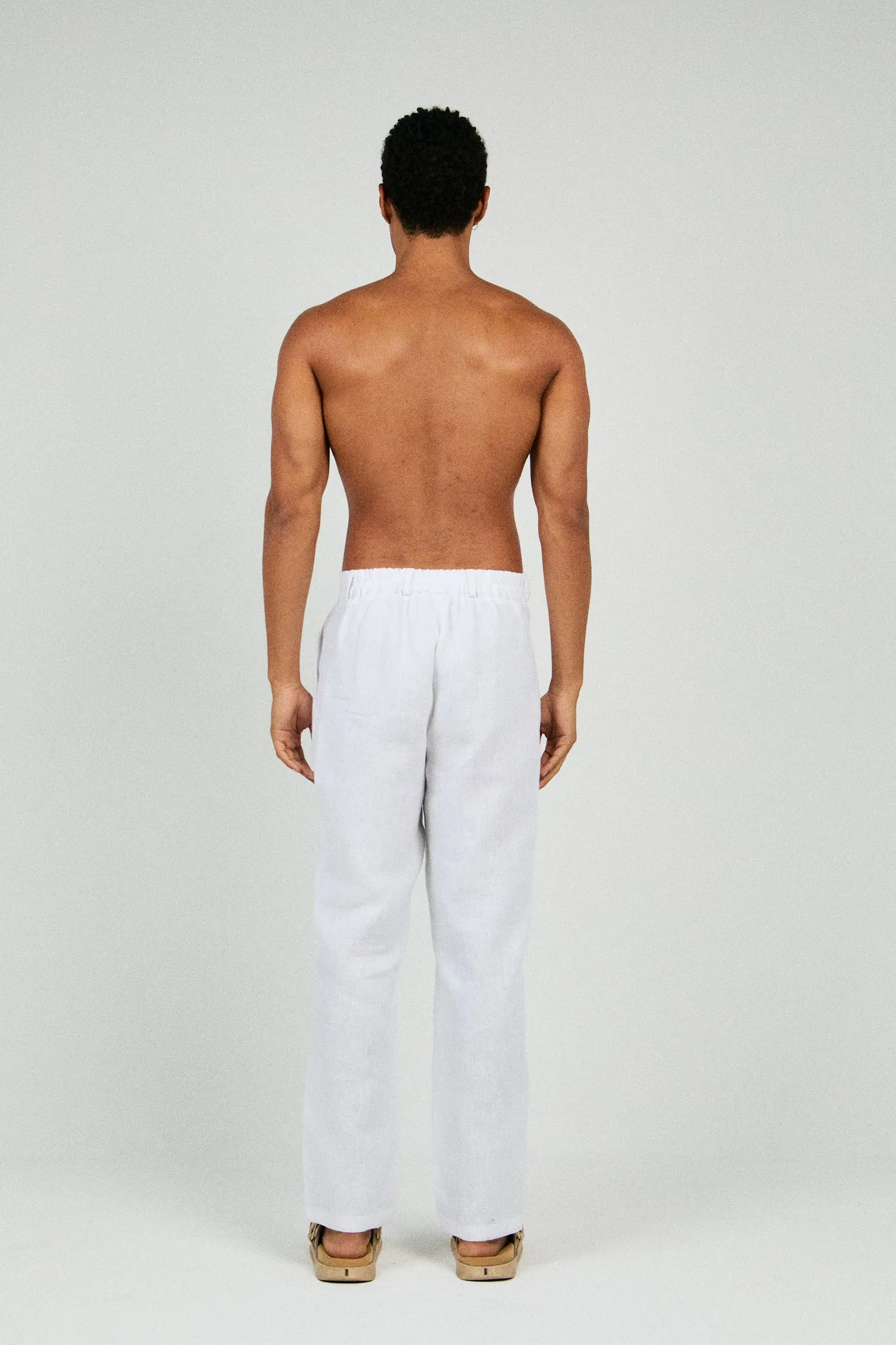 RELAXED FIT PLEATED LINEN PANTS