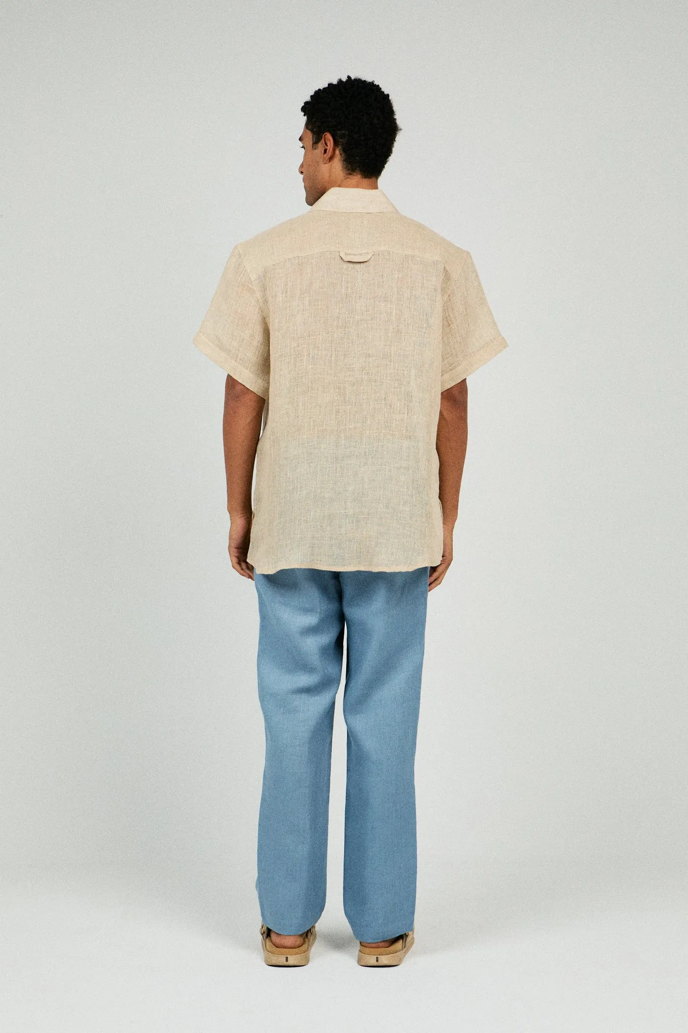 RELAXED FIT PLEATED LINEN PANTS