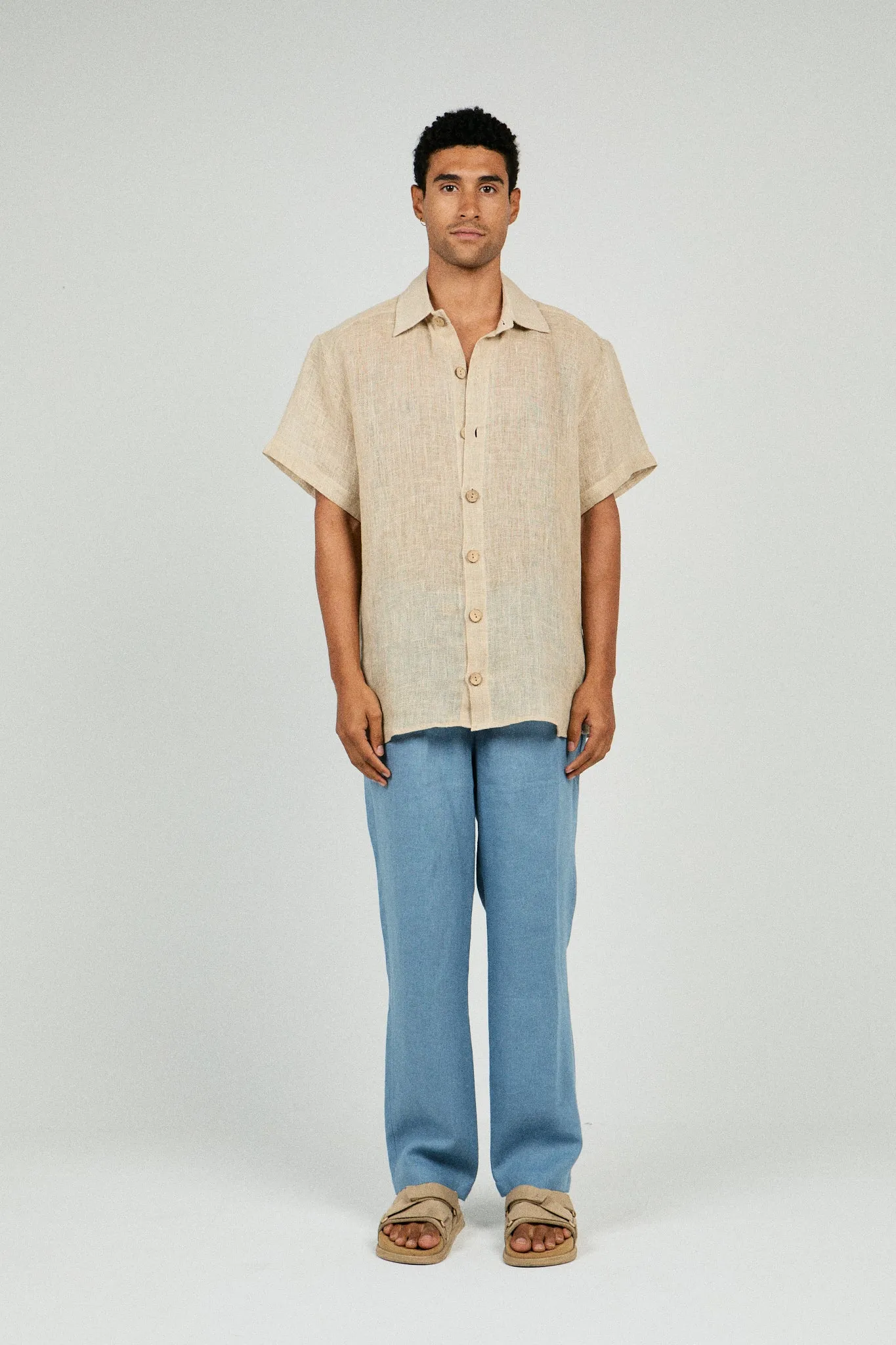 RELAXED FIT PLEATED LINEN PANTS