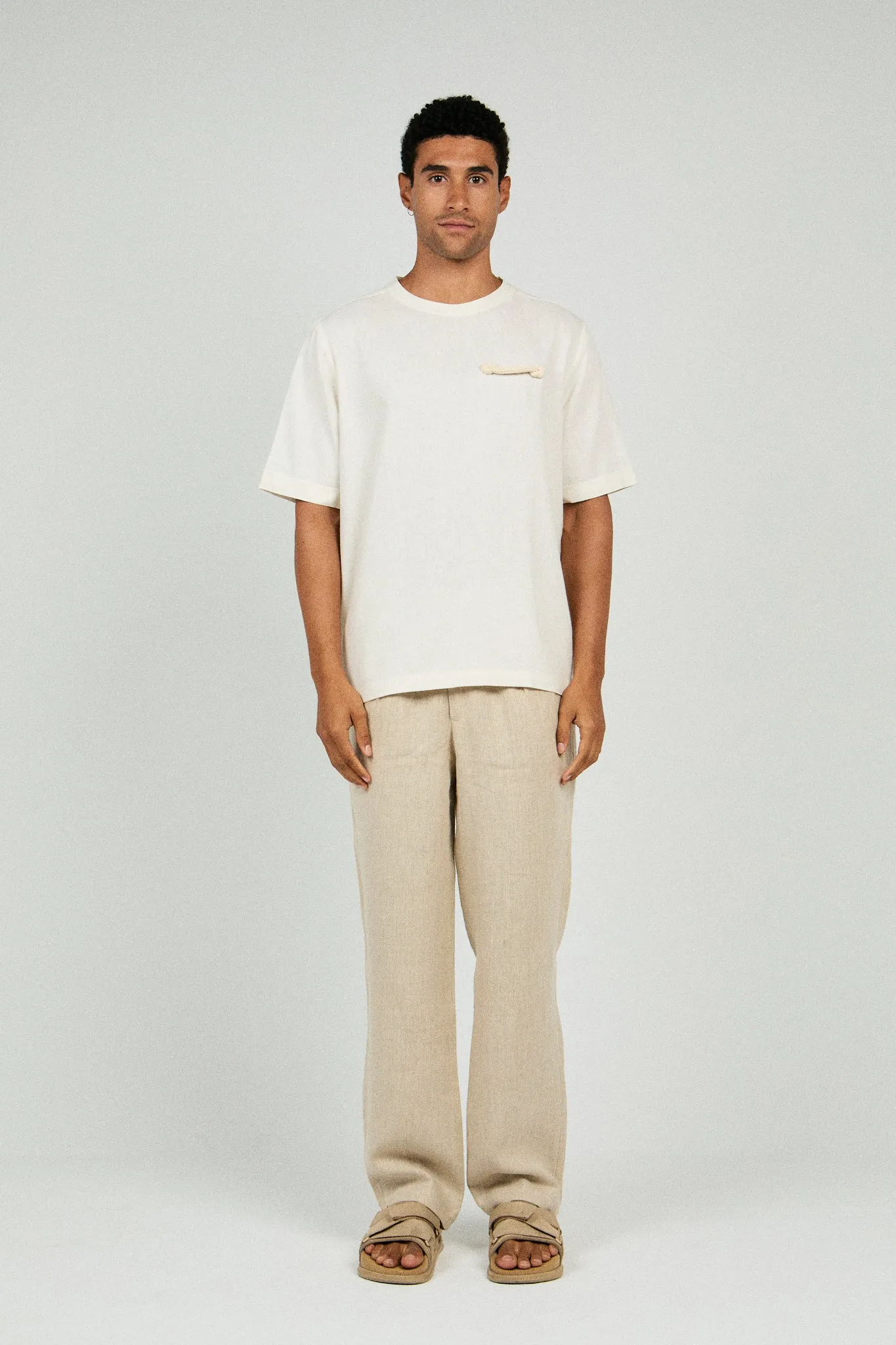 RELAXED FIT PLEATED LINEN PANTS