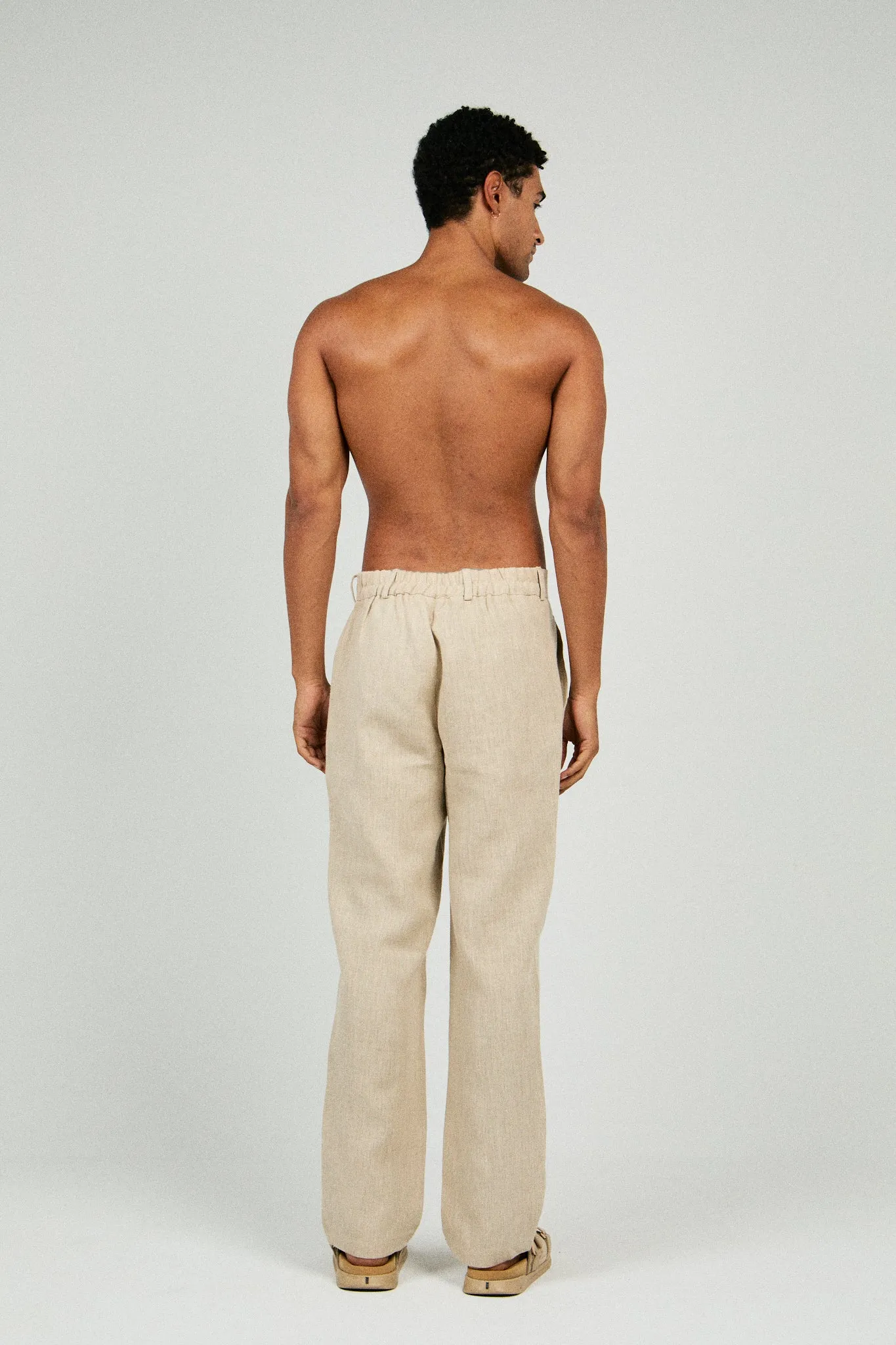 RELAXED FIT PLEATED LINEN PANTS